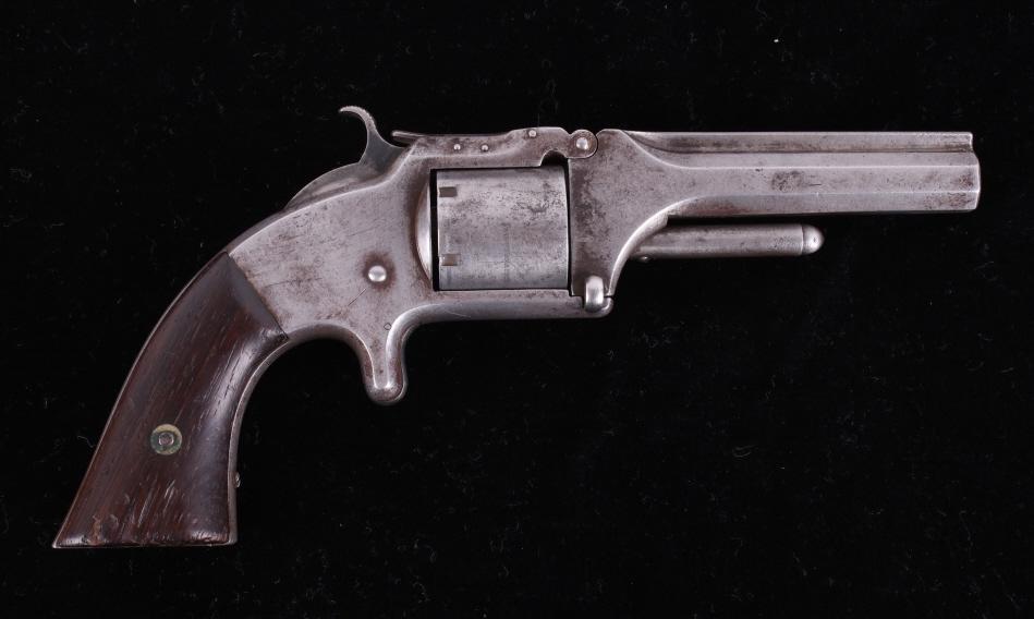 Smith & Wesson Model 1 1/2 First Issue Revolver: For your consideration is a Smith & Wesson Model 1 1/2 first issue. The Smith & Wesson Model 1 1/2 is a single-action, top-break revolver produced by Smith & Wesson. The original factory blue has fade