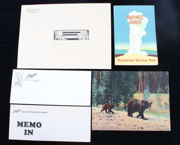 Haynes Yellowstone Park Guide & Paper Ephemera: Featured in this lot we have a collection of Frank Haynes Yellowstone Park guide with post card and letter heads. The collection consists of a Haynes guide to Yellowstone, a giant post card, and three