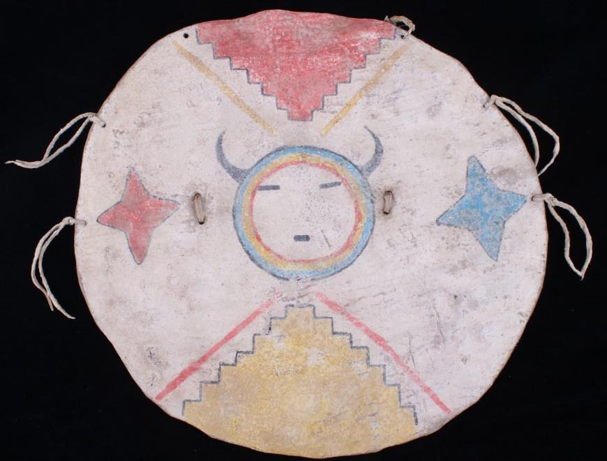 Pueblo Polychrome Painted Hide Shield c. 1890-1900: This is an excellent scarcely seen polychrome parfleche painted hide shield from the Pueblo Indians of the Southwest dating to circa 1890-1900’s. The shield is accompanied by a signed and dated latt