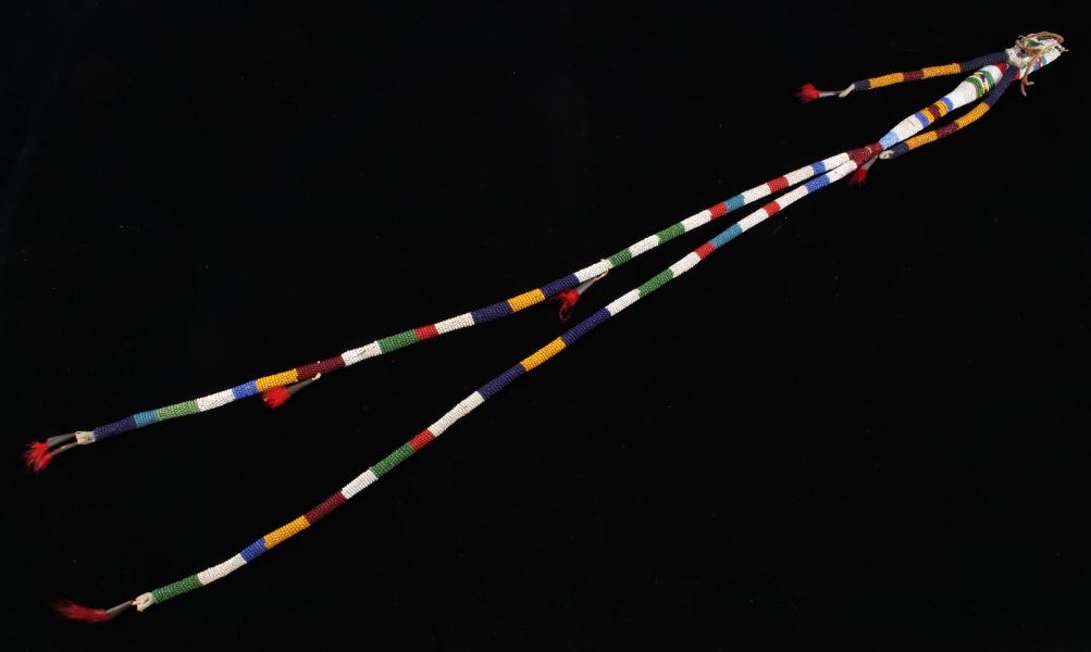 Crow Fully Beaded EXCEPTIONAL Awl Case c. 1900-: The lot features an amazing fully beaded awl case from the Crow Native American Indians from the early 1900’s. The piece shows a Buffalo Bison Indian tanned hide with unbelievable large strap with l