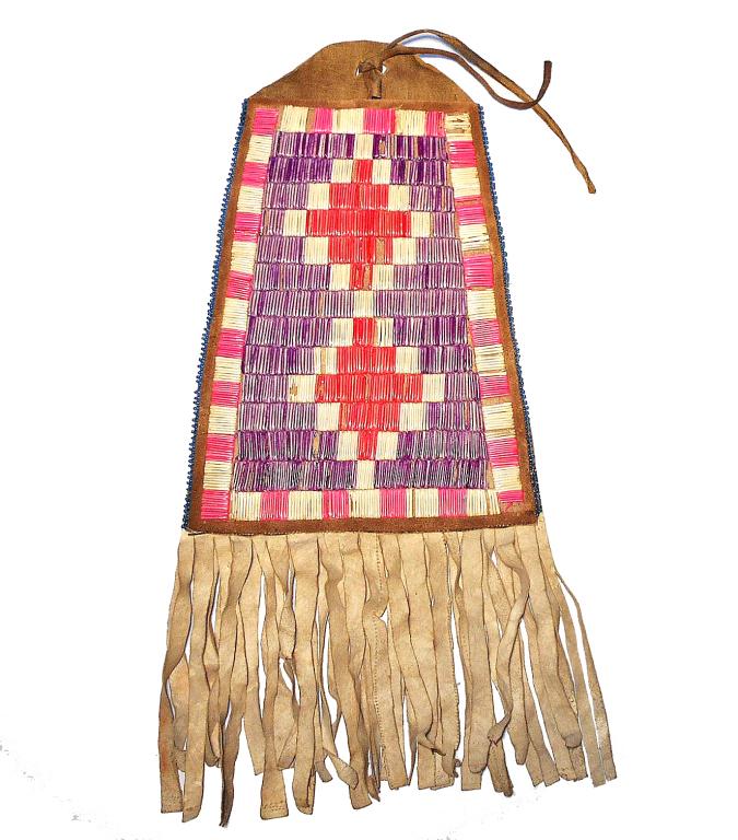Crow Fully Quilled Hide Dispatch Bag c. 1890: The lot features a quilled hide dispatch bag from the Crow Native American Indians and dates to circa 1890’s. The bag shows a Indian brain tanned buckskin construction with beautiful porcupine quill