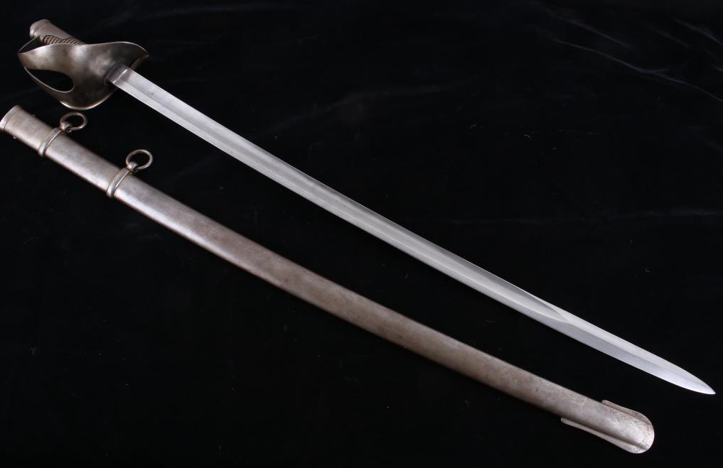 U.S. Model 1840 Cavalry S&K Saber & Scabbard: Included in this lot we have a Model 1840 U.S. Cavalry saber and scabbard originating from the 1840's. The sword was manufactured in Solingen, Germany by Schintzler & Kirschbaum and exported to the US