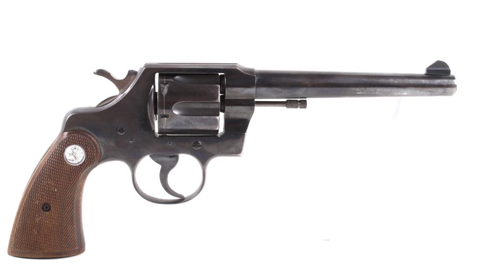 Colt Official Police .38 Special Revolver c.1950: For your consideration is an early Post-War Colt Official Police, .38 Special caliber revolver with desirable 6” barrel. This example is typical of those found in the holsters of most law enforcemen