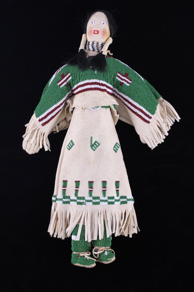 Sioux Mary Standstall Fully Beaded Hide Doll RARE: This is a very rare and authentic fully beaded doll from renowned Sioux Native American Indian, Mary Standstall dating the 20th Century. This example shows all Indian tanned hide with sinew sewing, re