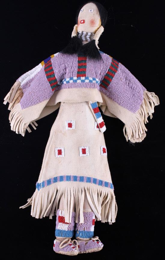 Sioux Mary Standstall Fully Beaded Hide Doll RARE: This is a very rare and authentic fully beaded doll from renowned Sioux Native American Indian, Mary Standstall dating the 20th Century. This example shows all Indian tanned hide with sinew sewing, re