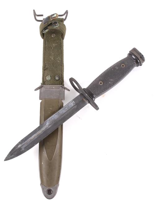 U.S. M8A1 M4 Second Production Bayonet & Sheath: Included in this lot we have an U.S. M8A1 M4 second production bayonet and original sheath originating from the 1950's to 1960's. The bayonet displays a steel blade with a black coating. The guard sho