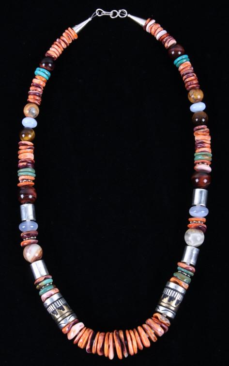 Navajo T&R Singer Multi Stone Necklace: For your bidding pleasure is a Navajo Native American T&R Singer multi stone necklace. This signed necklace features a string of orange spiny oyster, turquoise, tigers eye gemstones, as well as a few 