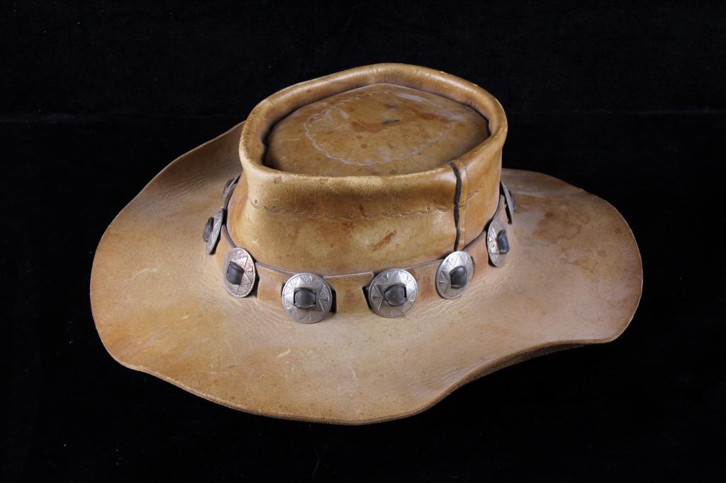 Vintage Cowboy Hat w/ Nickel Concho Band Accents: For your consideration is a vintage 1960-70's leather Vaccaro style hat with nickel concho band accents. This hat shows a nice tan leather construction with a detail stamped design along the crown and