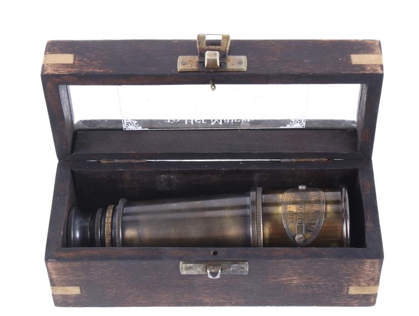 English Royal Navy Collapsing Telescope c. 1915: Featured in this lot we have an English Royal Navy collapsing brass spyglass and case originating from 1915. The piece shows brass construction with five different moving sections. The spy glass is ma