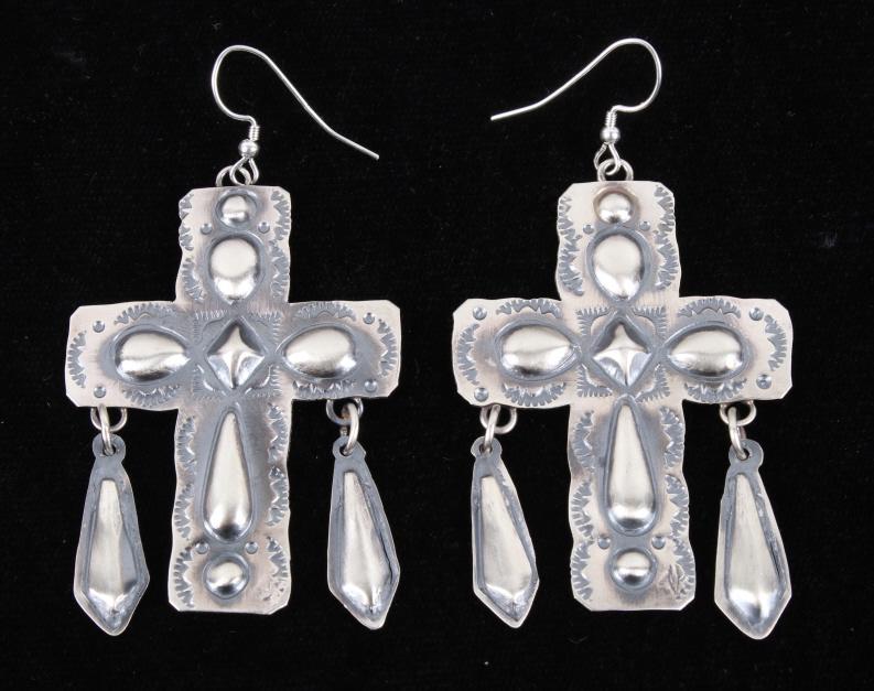 Navajo Yazzie Sterling Silver Repoussé Earrings: For your consideration is a pair of Navajo Native American Tim Yazzie sterling silver earrings. These gorgeous earrings feature a complex repoussé design with a hand stamped accent. The earrings depi