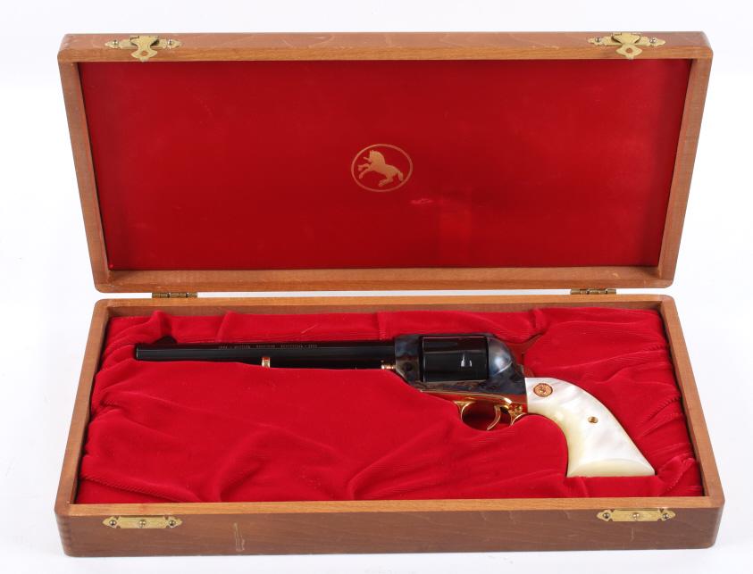 Colt Montana Territory Centennial SAA Revolver: For your consideration is a Colt Montana Territory Centennial Single Action Army .45 Long Colt revolver. This commemorative colt features a beautiful factory blue and gold finish with case colored fra