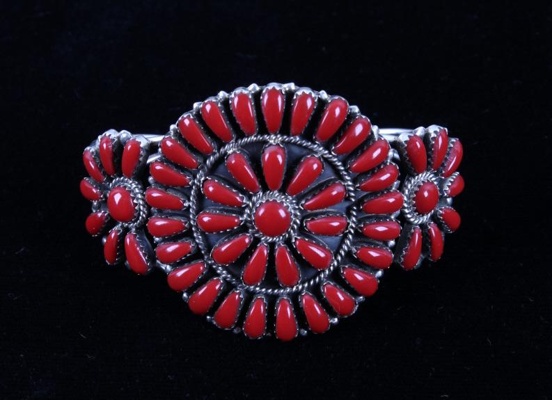 Navajo Sterling & Coral Petite Point Bracelet: Included in this lot we have a Navajo Native American signed sterling silver and ox blood coral petite point bracelet. The bracelet displays sterling silver construction with excellent petite point st