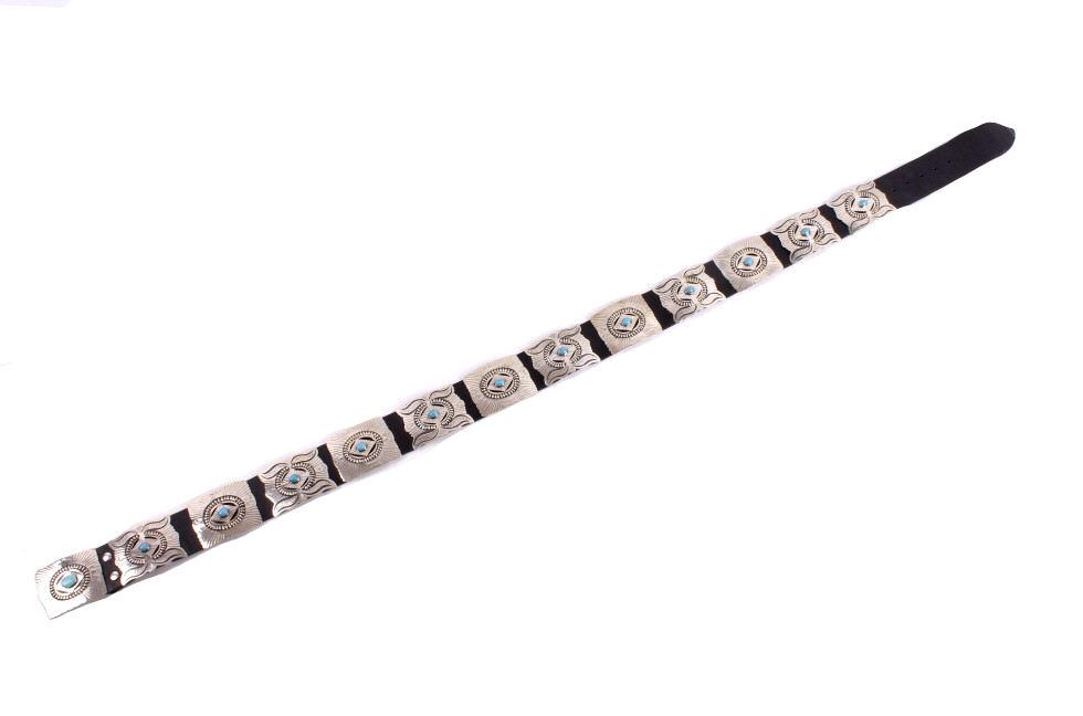 Armand American Horse Silver & Turquoise Belt: This lot contains a beautiful Armand American Horse Alpaca silver and Cripple Creek turquoise belt. This large belt features 13 gorgeous Alpaca silver hand stamped belt buckles that feature a single c