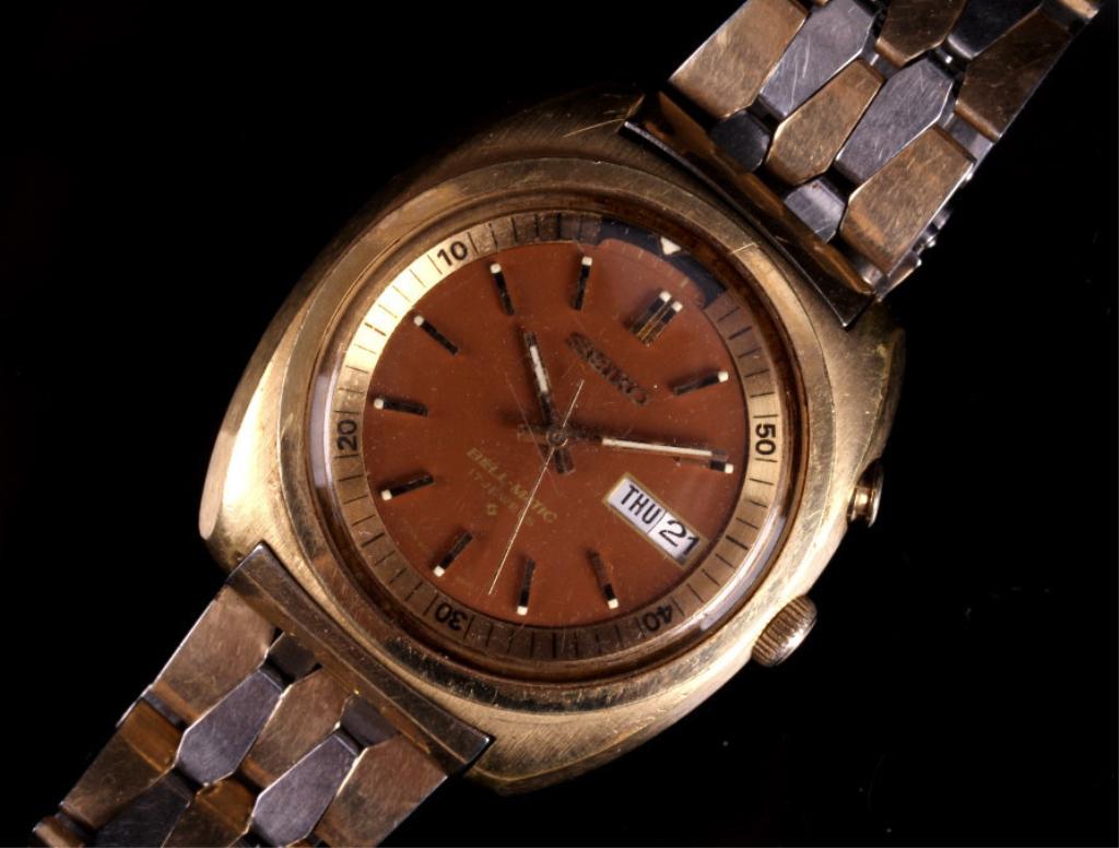 Seiko Bell-Matic 17 Jewels Automatic Alarm Watch: The lot features an original, circa 1960’s, Seiko Bell-Matic alarm, automatic men’s wrist watch in rare two tone coloring. The watch appears to work well, with the crown changing the time, day dat
