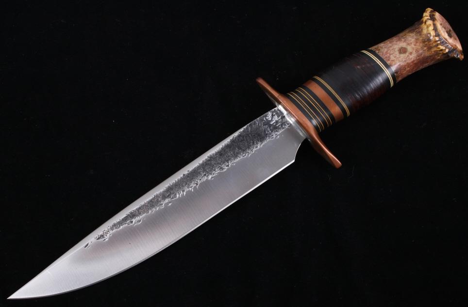 J. Behring Jr. Custom Stag Horn Bowie Knife: Featured in this lot is a James Behring Jr., custom stag horn bowie knife and custom leather sheath. James Behring is focused on creating beautiful custom knives that are highly functional in the fiel