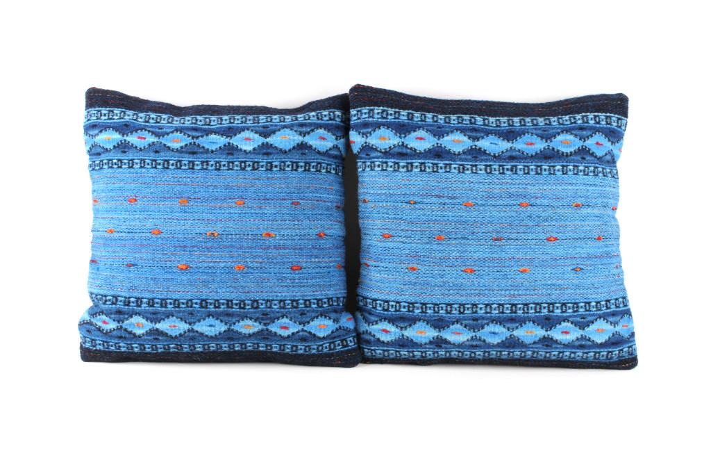 Night Stars Churro Wool Set of Two A. Gutierrez: The lot features an excellent set of two handwoven, flat weave pillows by master weaver Alicia Gutierrez. The pillows were made using 100% soft, fine, Churro Wool yarns. Churro wool is a time-tested f
