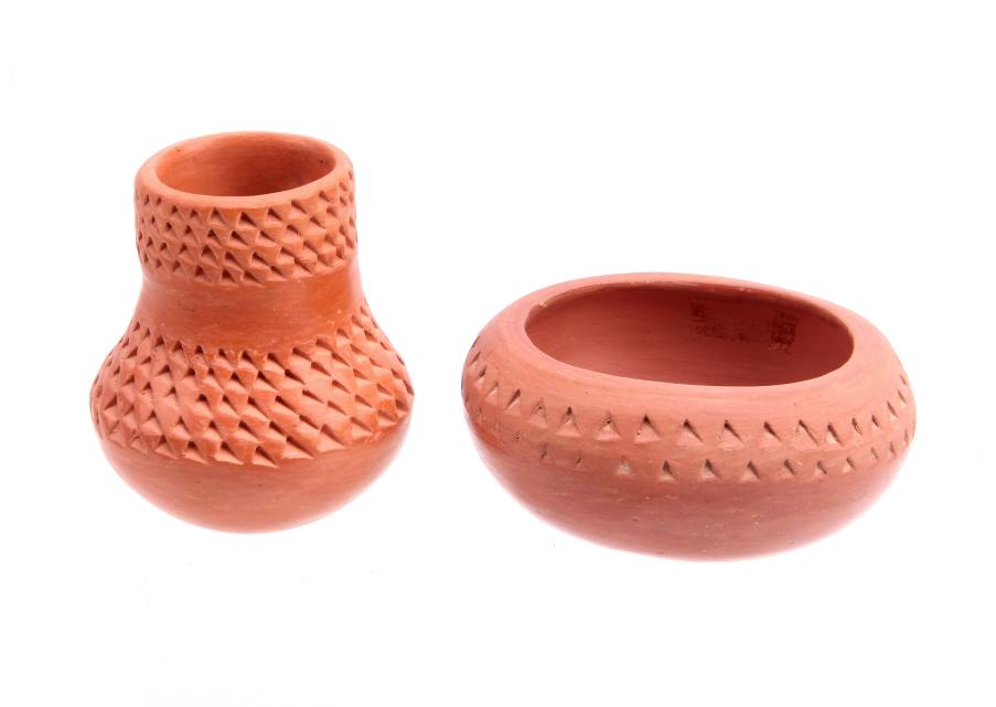 Hopi-Tewa Garnet Pavatea Redware Bowl/Vase: Featured in this lot is a Hopi-Tewa artist, Garnet Pavatea, redware textured bowl. Hopi-Tewa artist, Garnet Pavatea had a long and productive career of pottery making and was a favorite of collectors