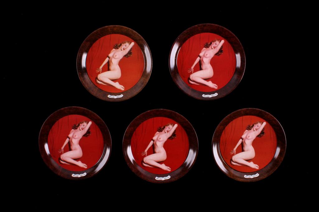 1950's Marilyn Monroe Nude Tip Tray Collection: This is a collection of five original Marilyn Monroe, nude tip trays from the 1950's. The trays are tin litho and are marked "Marilyn Monroe". Each tray is in very good condition. They measure 4" in d