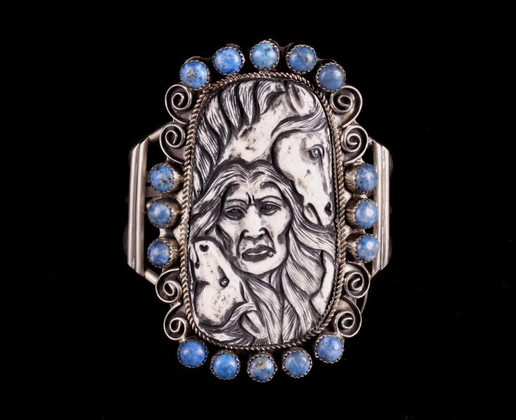 Navajo Lapis Lazuli Scrimshaw Silver Bracelet: For your consideration is this Navajo, lapis lazuli scrimshaw silver bracelet. This bracelet shows 16 round lapis lazuli cabochan stones set to a silver floral border with a three prong silver frame a