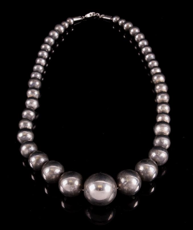 Taxco Silver Graduated Ball Necklace: For your consideration is this Taxco silver graduated ball necklace. The necklace shows 41 graduated silver balls, with the center silver ball being the largest. The chain of silver balls is attached 