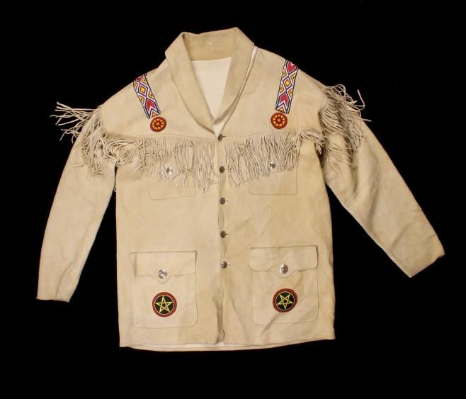 Mountain Man Indian Style Beaded Buckskin Coat: Offered in this lot is a large, handmade, Mountain Man Indian Style Beaded Buckskin Coat. The coat is made of a tan ruff side out buckskin. The coat is fringed along the front and back yoke and across