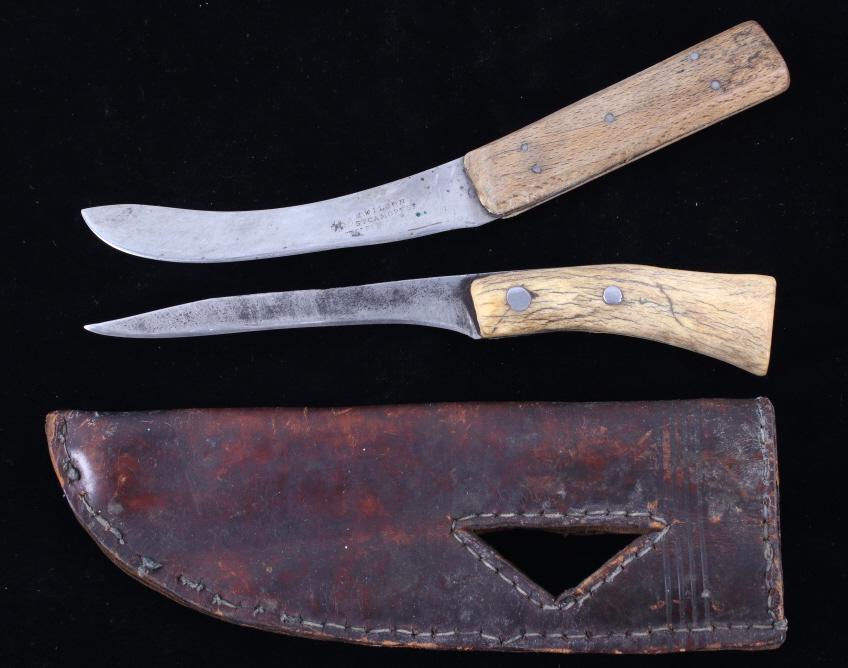 Blackfeet Belt Sheath & I. Wilson Knife 1800's: The lot features a fantastic 19th Century set of two skinning knives and a belt sheath from the Blackfeet Native American Indians of Northern Montana. The piece shows a traditional belt knife sheath d