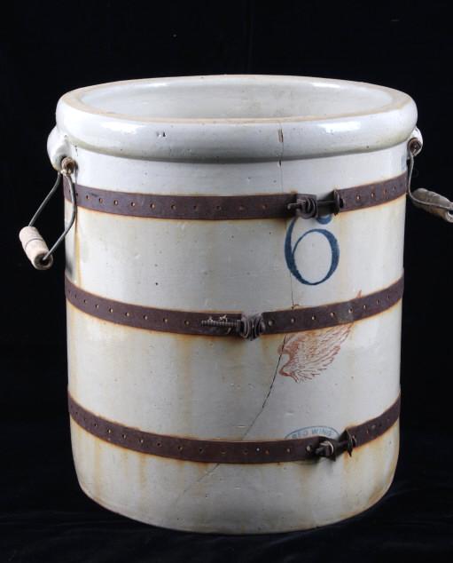 Red Wing Stoneware 6 Gallon Glazed Crock: Featured in this lot is a six gallon red wing glazed crock originating from the early 20th century. Red Wing Union Stoneware, now Red Wing Pottery, refers to American stoneware, pottery, or dinnerware