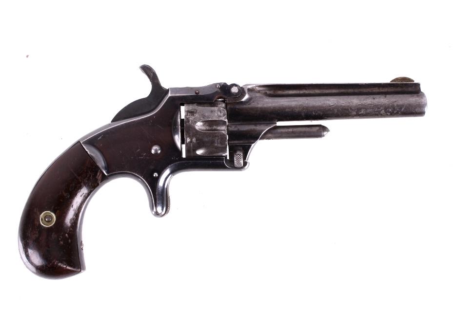 Smith & Wesson No. 1 3rd Issue Revolver: For your consideration is a Smith & Wesson No. 1 3rd Issue .22 RF revolver. The Model 1, 3rd Issue represented a substantial redesign for the Model 1, with a fluted cylinder, a round barrel, and a rou