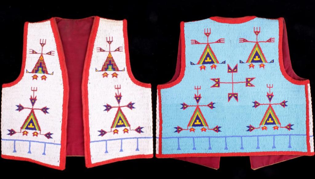 Sioux Fully Beaded Full Size Vest c. 1900-1960's: The lot features a fantastic, fully beaded vest from the Sioux Native American Indians, dating to the early to mid-1900s. The vest shows a hide and trade cloth constructed, full size adult vest, which