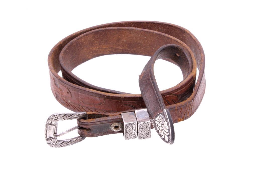 Early 1900's Navajo Sterling Ranger Buckle Set: Included in this lot is an early 1900's Navajo Native American, sterling silver Ranger buckle set. The ranger set includes the buckle, two keepers, and the belt tip. Each piece is made from solid ster