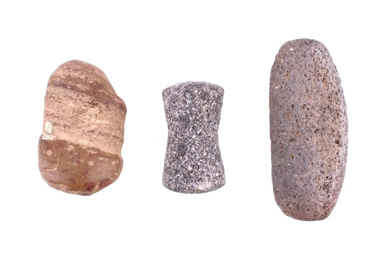 Neolithic Native American Celts c. 10000 – 4500 BC: Featured in this lot are these Native American celts from the Neolithic period, circa 10,000-4,500 BC. There are three celts in this collection. Two of the celts show porous surfaces attributed to a h