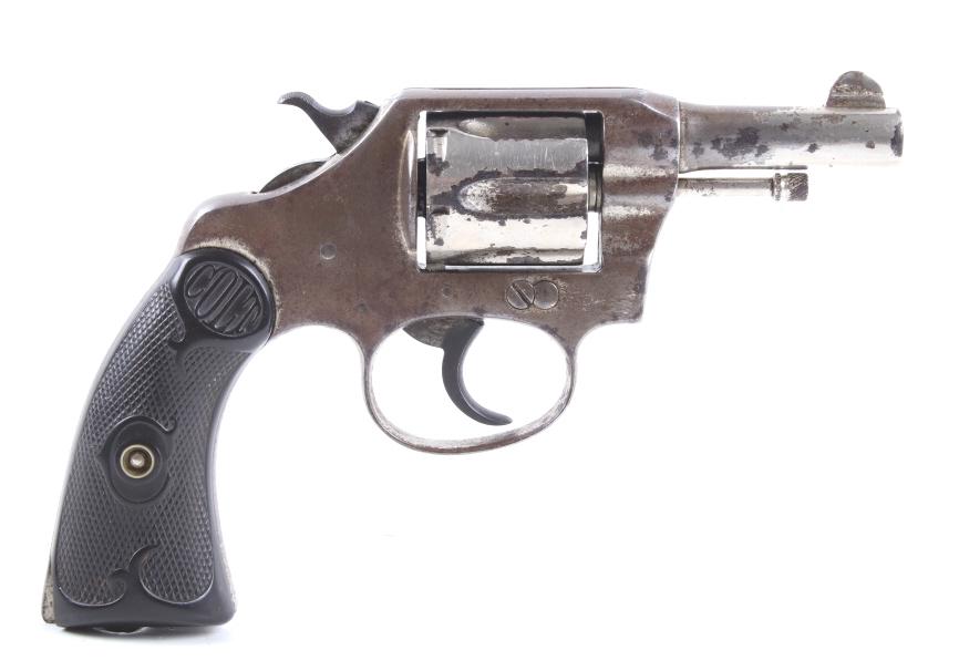 Colt Police Positive .32 Double Action Revolver: This lot offers you a Colt Police Positive revolver, chambered for .32. This piece features a 2 1/2" barrel, six shot cylinder, and original factory hard rubber grips. The grips display a molded check