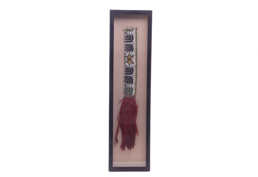 Native American Glass Trade Seed Beaded Sash: Included in this lot is a framed Native American glass trade bead sash. The sash displays the end of a sash showing various colors of glass trade seed beads; including chalk white, medium green, black