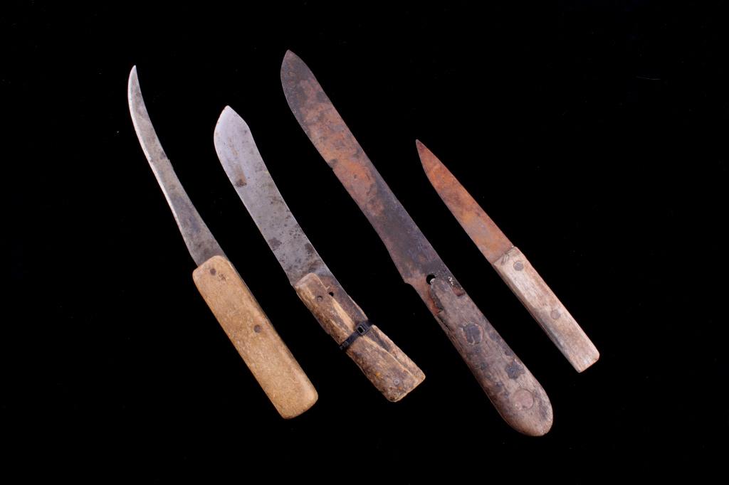 Northern Plains I. Wilson / Russell Trade Knives: The lot features a collection of four early Northern Plains Native American Indian trade knives, originating from the 19th Century. These 1800’s knives includes the following: The largest knife show