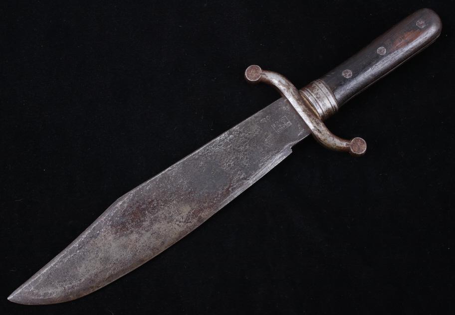Murray & Gray Co. Large Bowie Knife C.1863: Included in this lot we have a Murray and Gray Co large clip point bowie knife originating from 1863. The knife displays a large clip point style bowie blade, metal "S" guard, and wooden grip. The bla