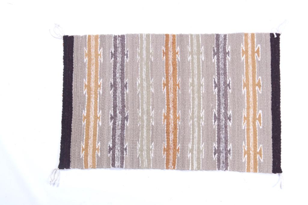 Navajo Wide Ruins Trading Post Rug Crownpoint: The rug is a fine Navajo Native American Indian wool rug with an excellent Wide Ruins pattern, hard spun from weaver Roselle Morgan. The Wide Ruins trading post was founded by Sally and William Lippin