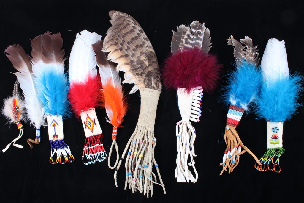 Flathead Indian Beaded Feather Dance Wands: Featured in this lot is a collection of beaded feather dance wands from the Flathead Native American Indians of Montana. The collection consists of eight feather dance wands with beaded hide handles. 