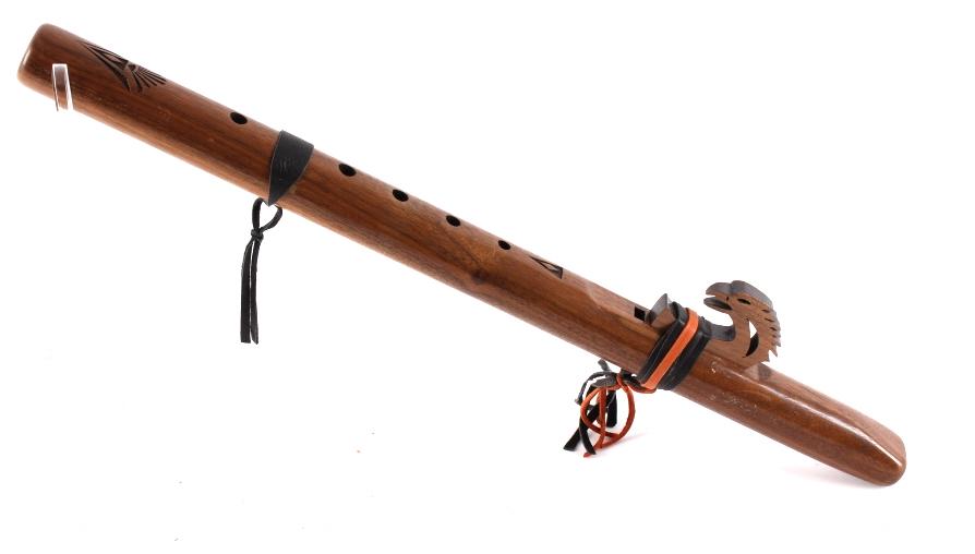 Lakota Flute Carved Bird Block c. Late 1900's: Featured in this lot is this Lakota flute carved bird block, circa late 1900's. This flute is well crafted in its modern style, showing a hand carved bird block that directs the player's breathe from