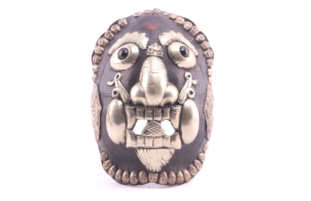 Kapala Tibetan Silver Turtle Shell Embossed Mask: Featured in this lot is this Kapala Tibetan silver inlay, turtle shell embossed mask. The silver content tested at .500. This is called a Kapala turtle mask and was used for Tantric Buddhist ceremonie