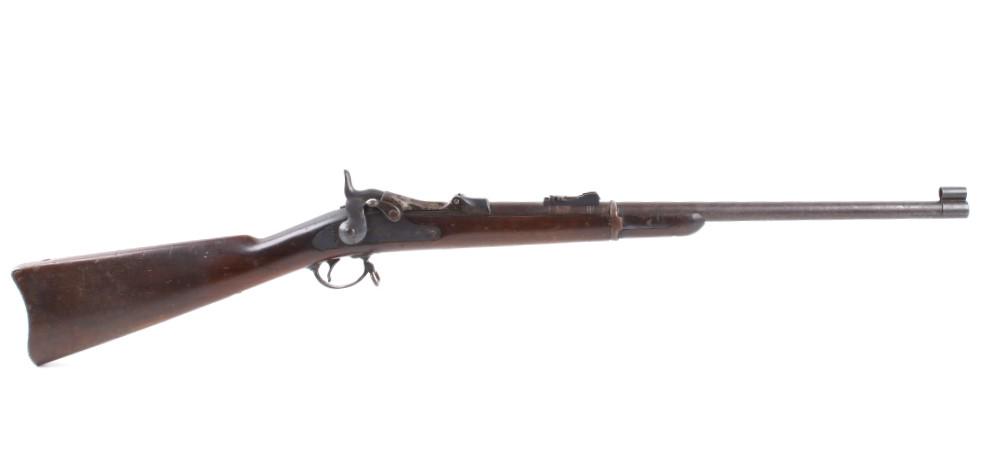Springfield Model 1884 .45-70 Carbine Length Rifle: Featured in this lot is an Early Model 1884 Springfield .45-70 caliber carbine length rifle. This is a fine early carbine made in 1889. It also has the Model 1884 Buffington ladder rear sight that is 