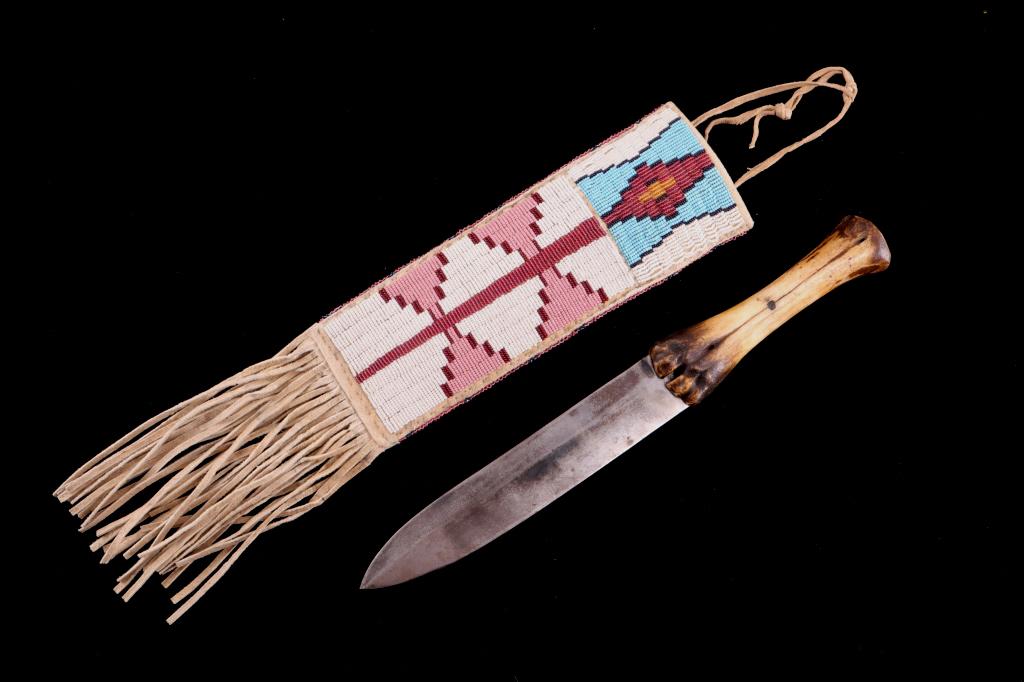 J. Rodgers & Sons Dag Knife 19th & Beaded Sheath: The lot features an early hallmarked Joseph Rodgers & Sons Maltese Cross dag knife with bone-handle, paired with a hide beaded sheath attributed to the Sioux Native American Indians of South Dakota. P