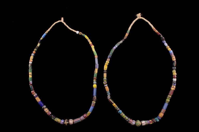 Pair Of Venetian Trade Bead Sampler Necklaces: Offered in this lot is a pair of Venetian trade bead sampler necklaces. These necklaces show a large assortment of the various different beads that were produced for trade with Native people of the wo