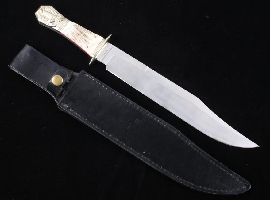 Schrade Alligator Horse Bowie Knife & Sheath: Featured in this lot is a Schrade custom antler handle, bowie style fighting knife and leather sheath. The half horse half alligator coffin pommel is a design seen almost exclusively on original early