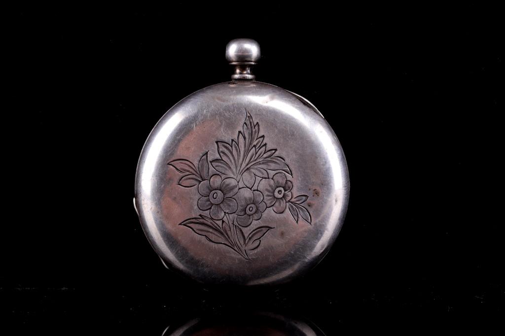 1800-1900 Robert Feres Geneva Silver Pocket Watch: Featured in this lot is this art nouveau etched pocket watch from Robert Feres Geneva Watches. The watch features a traditional construction with three layers of hinged assets and decoration on the ou