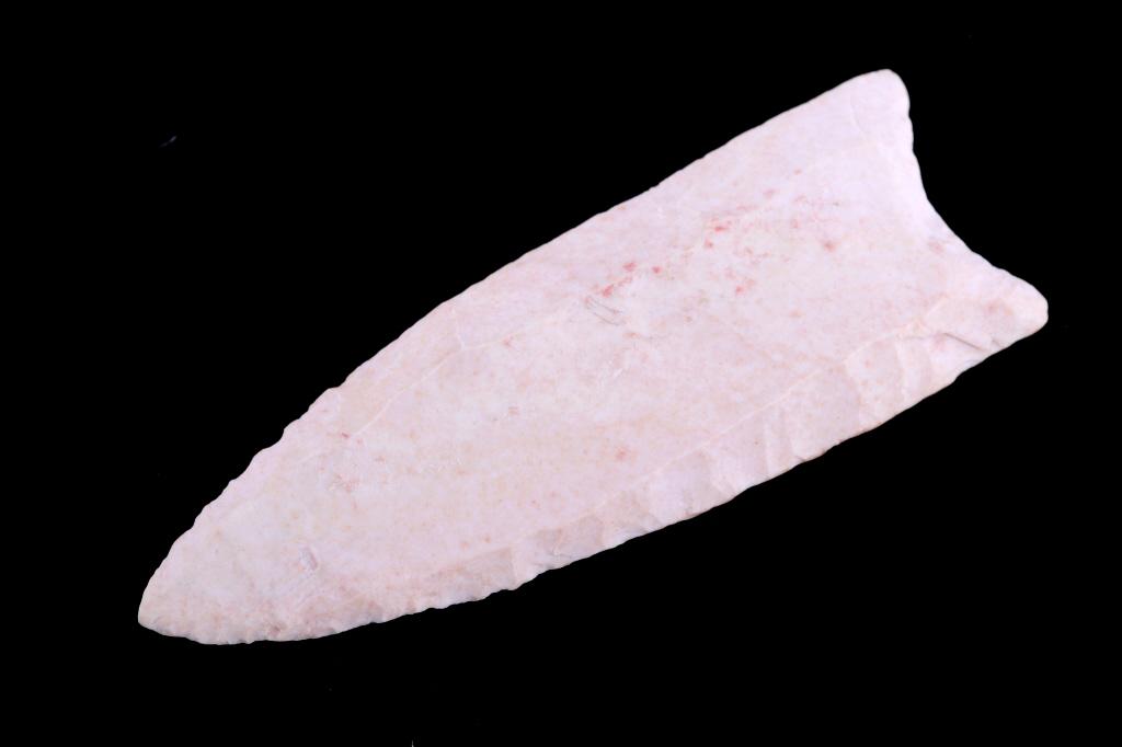 Clovis Fluted Chert Point 15,000 - 10,000 B.P.: Featured in this lot is this Clovis fluted chert point aged from The Paleo Period and 15,000 - 10,000 B.P. The point is a thin small to medium sized point with a fully fluted side and a 3/4 fluted sid