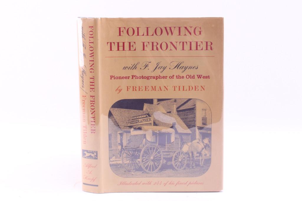 Following the Frontier With Haynes by Tilden 1st E: Offered in this lot is a 1964 first edition of “Following the Frontier with F. Jay Haynes Pioneer Photographer of the Old West” by Freeman Tilden. The book has its original un-clipped dust