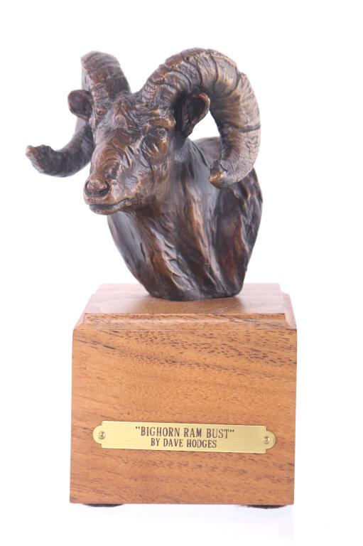 "Bighorn Ram Bust" Bronze By Dave Hodges: Featured in this lot is this bronze sculpture called "Bighorn Ram Bust" from Montana artist Dave Hodges (born in 1949). This bronze is a Rocky Mountain Bighorn Sheep Ram bust sculpture and features th