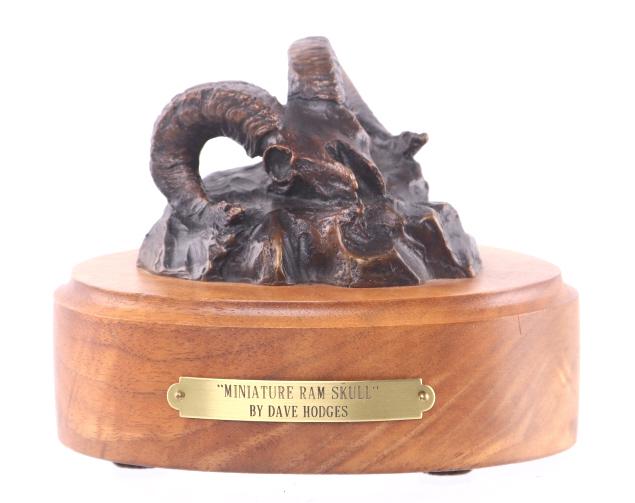 Hodges, Dave (1949 -) "Miniature Ram Skull": Featured in this lot is this bronze sculpture called "Miniature Ram Skull," from Montana artist Dave Hodges born in 1949. This bronze features a miniature Rocky Mountain Bighorn Sheep (Ram) skull scul