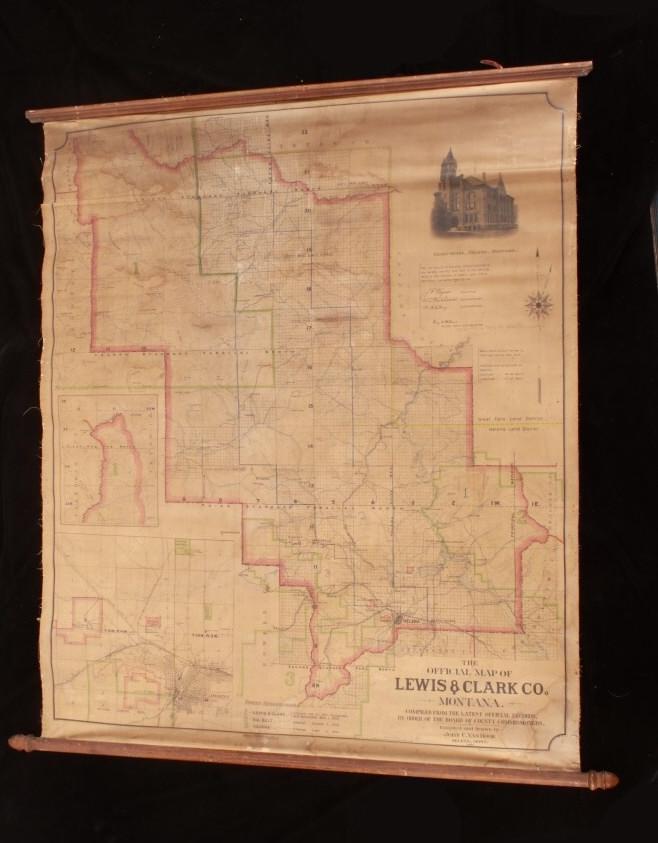 The Official Map of Lewis & Clark County - Montana: Featured in this lot is The Official Map of Lewis & Clark County - Montana. The map features a wonderfully and professionally crafted linen back construction with hand colored design and original turn