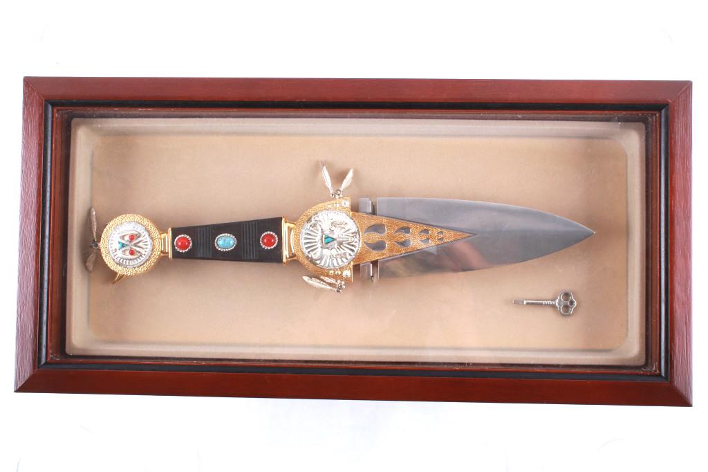 Franklin Mint "Talisman' Ceremonial Dag Knife: Featured in this lot is this Franklin Mint "Talisman" ceremonial dag knife. The knife features a broad double edge dag knife blade with a gilt trim and Morenci turquoise set into the hilt and pommel o